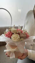 Composition d'un pot floral en bougies